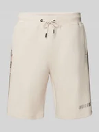 Spodenki męskie - Szorty z dzianiny dresowej o kroju regular fit z nadrukiem z logo model ‘MICKEY’ - miniaturka - grafika 1