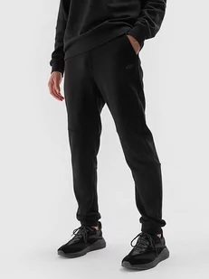 4F Spodnie dresowe w kolorze czarnym - Spodnie sportowe męskie - miniaturka - grafika 1