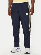 Spodnie sportowe męskie - adidas Spodnie dresowe House of Tiro IW3582 Granatowy Regular Fit - miniaturka - grafika 1