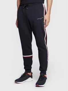Spodnie sportowe męskie - Tommy Hilfiger Spodnie dresowe New Global Stripe MW0MW29461 Granatowy Regular Fit - grafika 1