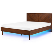 Łóżka - Beliani Łóżko LED 180 x 200 cm ciemne drewno MIALET - miniaturka - grafika 1