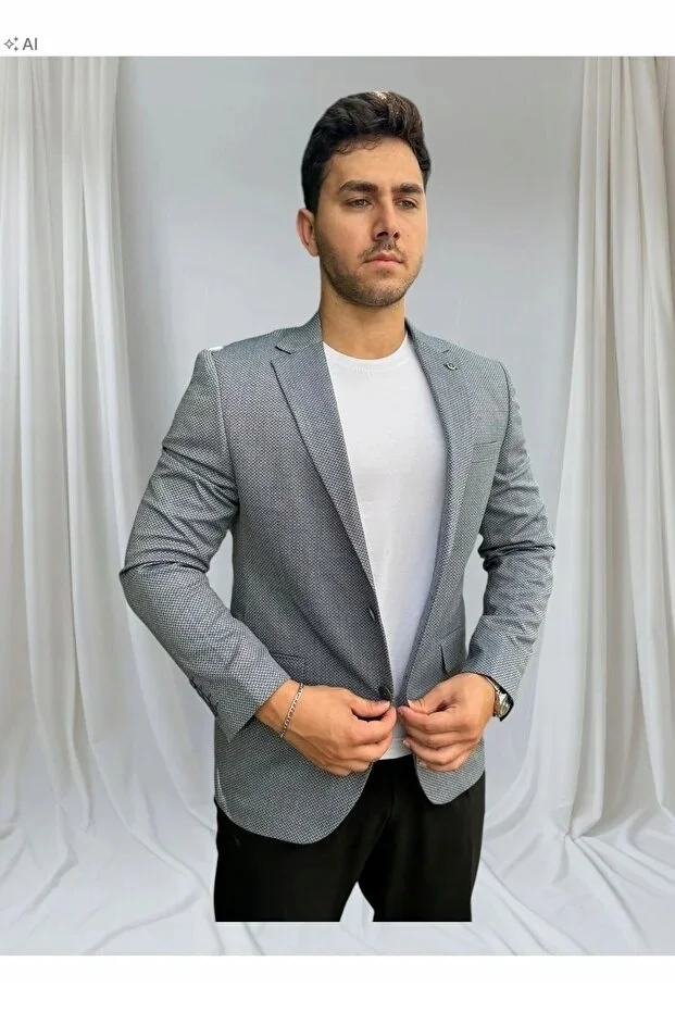 ELEGANCKA MĘSKA MARYNARKA MELANŻOWA W STYLU MINIMALISTYCZNYM 50 5IA
