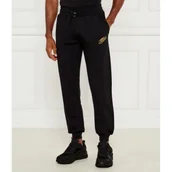 Dresy męskie - Plein Sport Spodnie dresowe | Loose fit - miniaturka - grafika 1