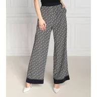 Spodnie damskie - Tommy Hilfiger Spodnie MONOGRAM | flare fit - miniaturka - grafika 1