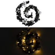 Ozdoby bożonarodzeniowe - vidaXL Świąteczna girlanda z lampkami LED czarna 2,7 m PVC 320973 - miniaturka - grafika 1