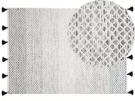 Wycieraczki - Beliani Dywan krótkowłosy 140 x 200 cm czarno-biały GEMLIK - miniaturka - grafika 1