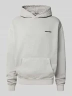 Bluzy męskie - Bluza o kroju oversized z kapturem, wyhaftowanym logo i kieszenią kangurką - miniaturka - grafika 1