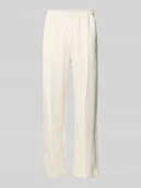 Spodnie sportowe męskie - spodnie dresowe z pionowymi przeszyciami i wyhaftowanym logo - miniaturka - grafika 1