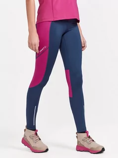 Spodnie sportowe damskie - Craft Legginsy sportowe "ADV Essence Warm" w kolorze granatowo-różowym - grafika 1