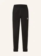 Moda i Uroda OUTLET - Adidas Originals Spodnie Dresowe Adicolor schwarz - miniaturka - grafika 1