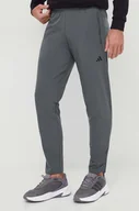 Spodnie męskie - adidas Performance spodnie treningowe kolor zielony gładkie - miniaturka - grafika 1
