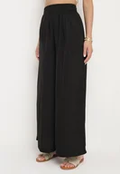 Spodnie damskie - Czarne Szerokie Spodnie z Wiskozą i Wysokim Stanem i Gumką w Talii Kelevevia - miniaturka - grafika 1