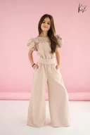 Kombinezony dla dzieci - Kombinezon dziewczęcy komunia wesele Kiz By Kids beżowy rozmiar 164 - miniaturka - grafika 1