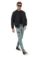 Dresy męskie - TRENDYOL MAN MĘSKIE SPODNIE DRESOWE Z ZAMKIEM I MANKIETEM NIEBIESKIE M 5DA - miniaturka - grafika 1