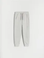 Spodnie i spodenki dla chłopców - Reserved - Joggery z dresowej dzianiny - jasnoszary - miniaturka - grafika 1