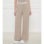 Dresy damskie - EA7 Spodnie dresowe | flare fit - miniaturka - grafika 1