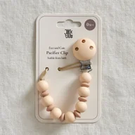 Akcesoria do smoczków - Zawieszka, klips do smoczka, gryzak beżowy JackOJuno - miniaturka - grafika 1