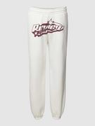 Spodnie sportowe damskie - Spodnie dresowe z nadrukiem z logo model ‘PUFF STAR’ - miniaturka - grafika 1