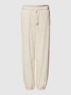 Spodnie dresowe z tunelem - Spodnie sportowe damskie - miniaturka - grafika 1