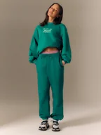 Bluzy damskie - 4F Bluza dresowa loose bez kaptura damska - zielona XS - miniaturka - grafika 1