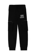 Spodnie i spodenki dla chłopców - Coccodrillo spodnie dresowe bawełniane dziecięce kolor czarny gładkie - miniaturka - grafika 1