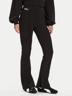 Spodnie sportowe damskie - Puma Spodnie dresowe PUMA X ROSÉ 635156 01 Czarny Slim Fit - miniaturka - grafika 1
