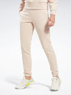 Reebok Spodnie dresowe Fleece IC3502 Beżowy Slim Fit - Spodnie sportowe damskie - miniaturka - grafika 1