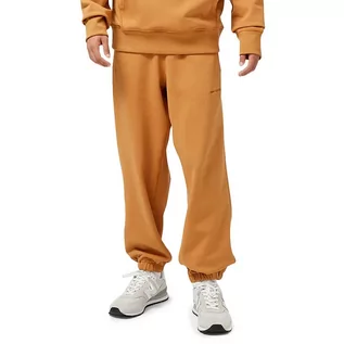 Spodnie sportowe męskie - Spodnie dresowe New Balance MP23551TOB - pomarańczowe - grafika 1