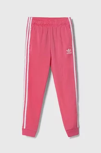 Spodnie i spodenki dla dziewczynek - adidas Originals spodnie dresowe dziecięce kolor różowy z aplikacją - grafika 1