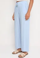 Spodnie damskie - Jasnoniebieskie Gładkie Spodnie z Gumką w Pasie i Szerokimi Nogawkami Alathera - miniaturka - grafika 1