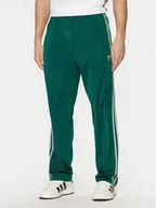 Spodnie sportowe męskie - adidas Spodnie dresowe adicolor Classics Firebird JP2539 Zielony Regular Fit - miniaturka - grafika 1
