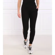 Dresy damskie - GUESS ACTIVE Spodnie dresowe BRITNEY | Regular Fit - miniaturka - grafika 1