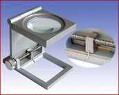 Mikroskopy i lupy - Carton Lupa tkacka x6 z podziałką skala 1.0mm - miniaturka - grafika 1