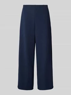 Spodnie damskie - Spodnie materiałowe o kroju regular fit z elastycznym pasem - grafika 1