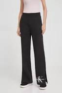Spodnie damskie - Calvin Klein Jeans spodnie dresowe bawełniane kolor czarny z nadrukiem - miniaturka - grafika 1