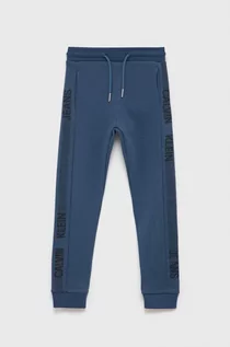 Spodnie damskie - Calvin Klein Jeans Jeans Spodnie bawełniane dziecięce kolor granatowy z nadrukiem - grafika 1