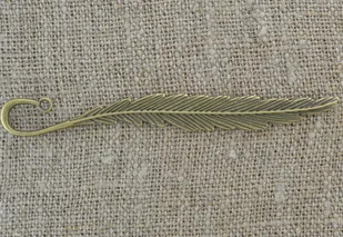 [17199] Zakładka do książki piórko w kolorze brązu - Zakładki indeksujące - miniaturka - grafika 1