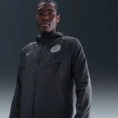 Kurtki i kamizelki sportowe męskie - Męska kurtka piłkarska Nike Paris Saint-Germain Impossibly Light Windrunner - Szary - miniaturka - grafika 1