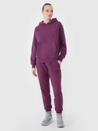 Spodnie sportowe damskie - 4F Spodnie dresowe joggery damskie - fioletowe S - miniaturka - grafika 1