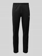 Spodnie sportowe męskie - Spodnie dresowe o kroju slim fit z wyhaftowanym logo model ‘BECKENBAUER’ - miniaturka - grafika 1