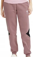 Spodnie męskie - Spodnie dresowe damskie Puma Rebel Pants S różowe - miniaturka - grafika 1