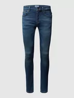 Spodnie męskie - Jeansy w dekatyzowanym stylu o kroju slim fit - miniaturka - grafika 1