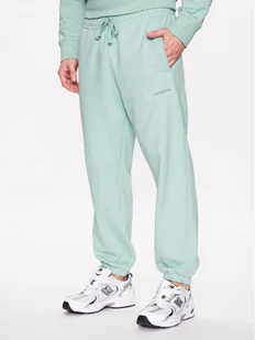 New Balance Spodnie dresowe MP23551 Zielony Relaxed Fit - Spodnie sportowe męskie - miniaturka - grafika 1