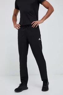 adidas spodnie treningowe Essentials Stanford kolor czarny z aplikacją - Spodnie męskie - miniaturka - grafika 1