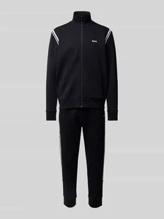 Dres z paskami w kontrastowym kolorze - Spodnie sportowe męskie - miniaturka - grafika 1