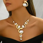 Inne - TEMU Dwuczęściowy zestaw biżuterii dla kobiet, jeden Y-kształtny naszyjnik z wieloma spiralnymi małżkami włożonymi w owalne sztuczne perły różnych - miniaturka - grafika 1
