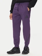 Spodnie sportowe męskie - adidas Spodnie dresowe Z.N.E. JW4726 Fioletowy Loose Fit - miniaturka - grafika 1