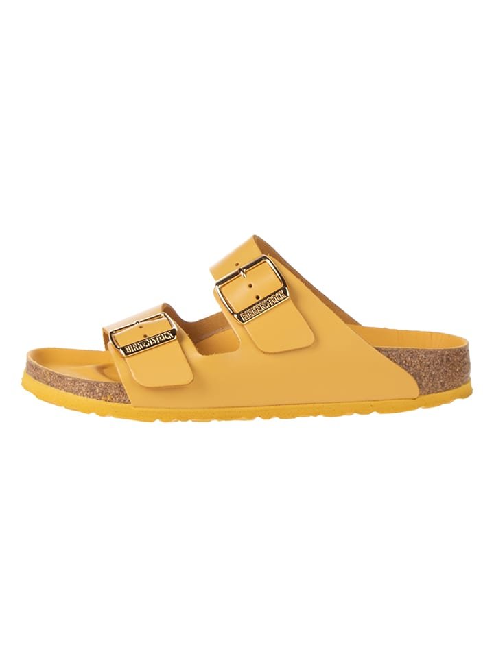 Birkenstock Skórzane klapki w kolorze żółtym