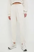 Dresy damskie - REEBOK - SPODNIE DRESOWE DAMSKIE CL RBK ND PANT HS0373 Kremowe - miniaturka - grafika 1