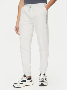 Tommy Hilfiger Spodnie dresowe UM0UM03348 Beżowy Regular Fit - Spodnie sportowe męskie - miniaturka - grafika 1